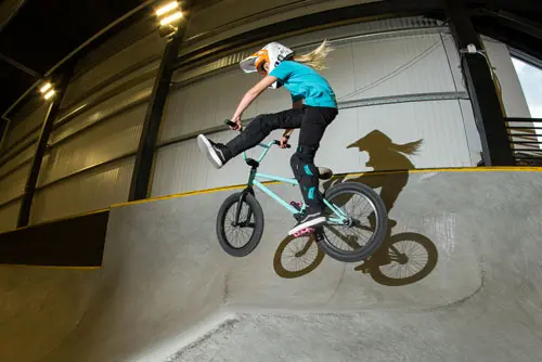 BMX rider jumping in Concrete Park